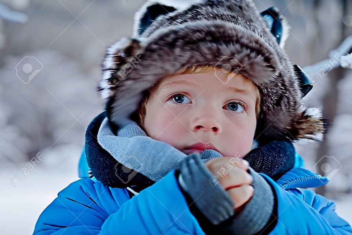 Portrait of little boy in winter time