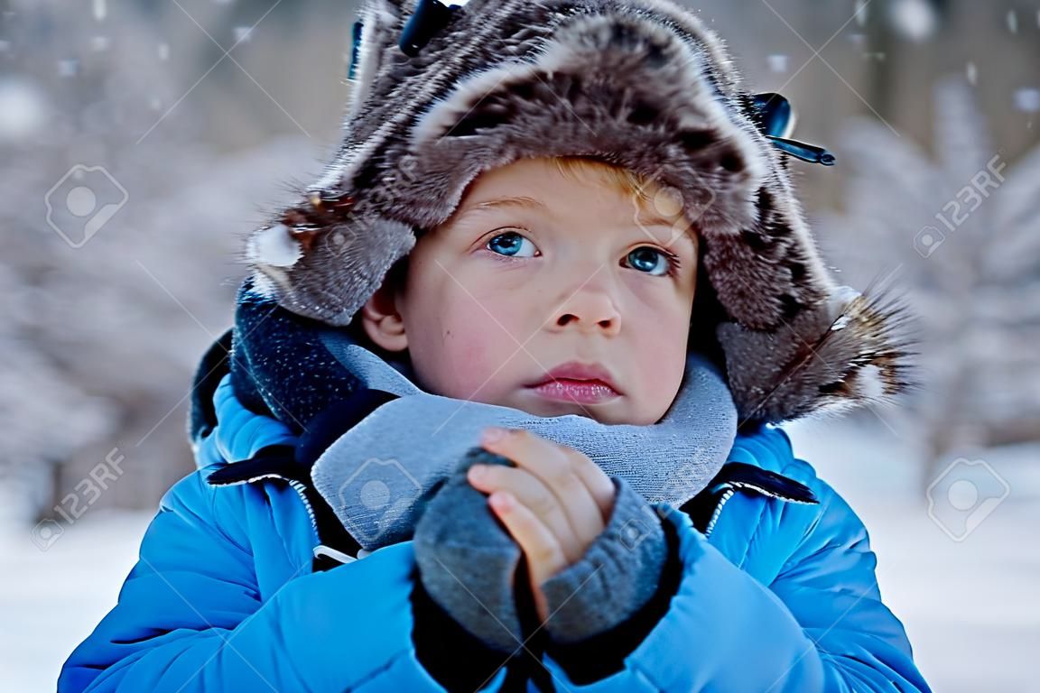 Portrait of little boy in winter time