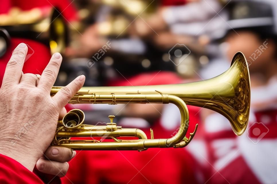 Closeup of the fingers of a male trumpet player in a Mexican city