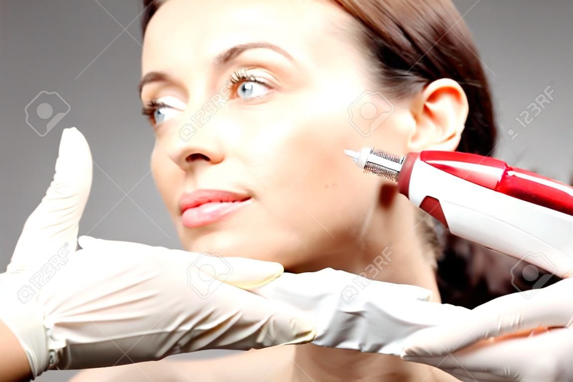 Mesotherapy Microneedle, the woman at the beautician