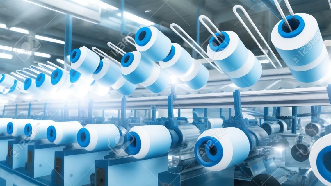 Row of automated machines for yarn manufacturing. Modern Textile Plant. Textile manufacturing of synthetic fibers.