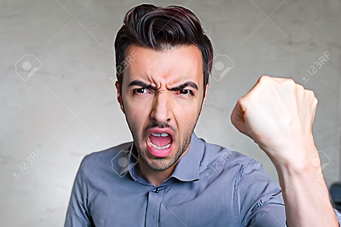 business man threatening with fist