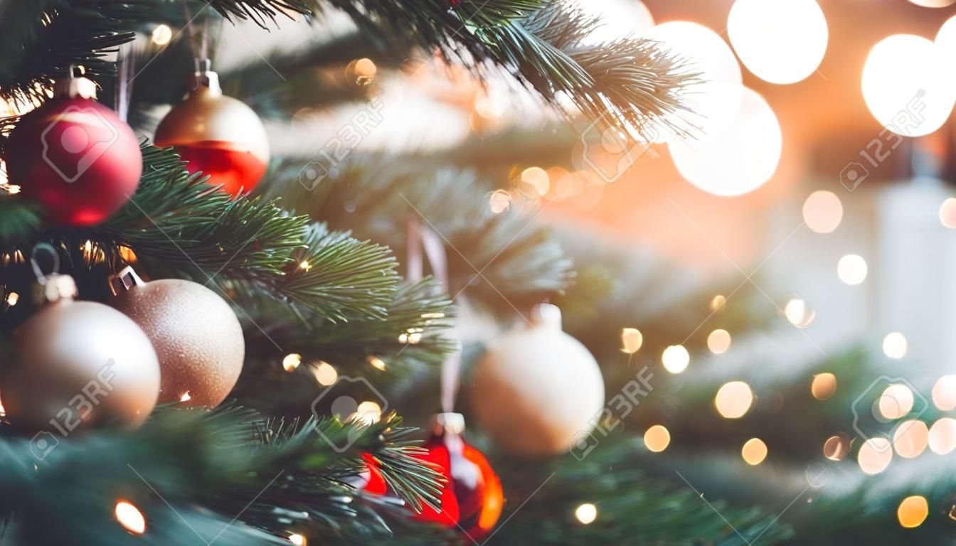 Decorated christmas tree on blurred background with bokeh