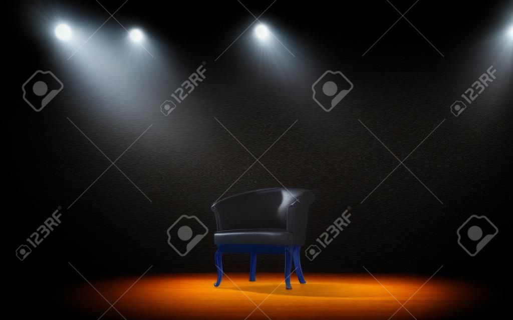 스포트 라이트 아래 무대에 의자