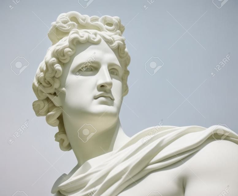 Portrait of a plaster statue of Apollo isolated on white