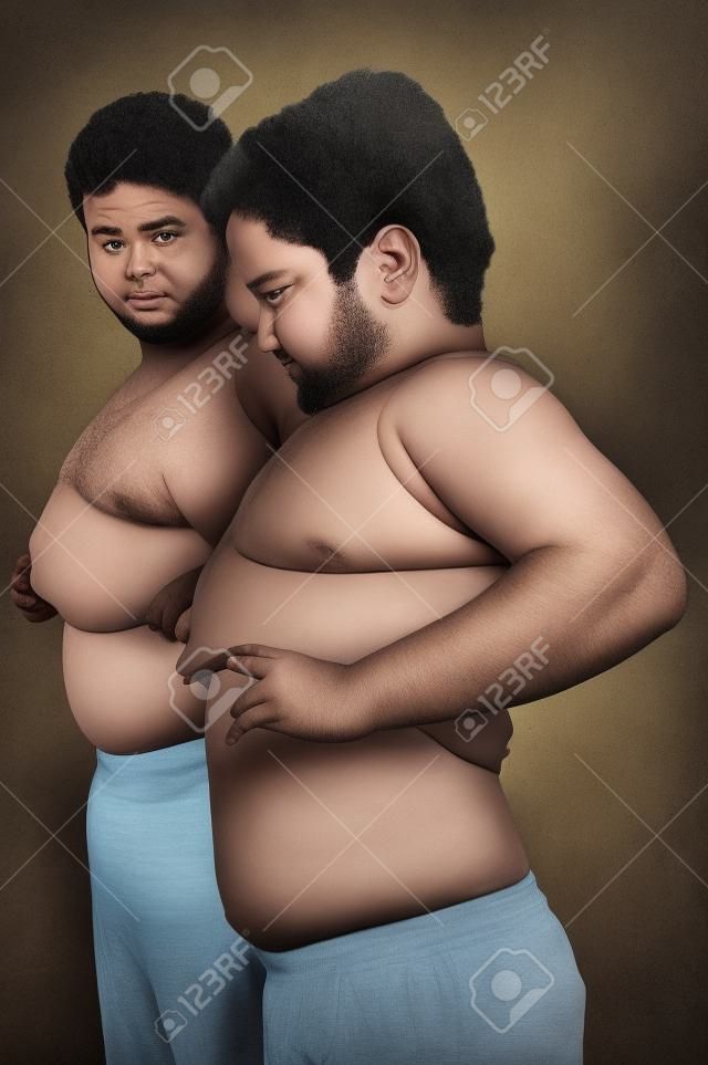 zwei dicke Jungs zeigen ihre Bäuche