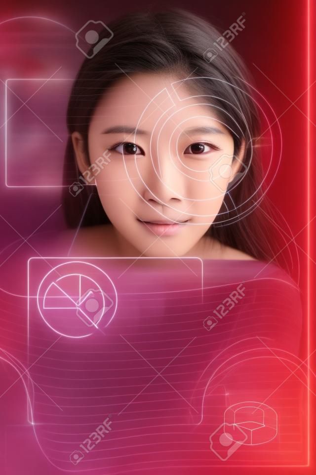 顔認識の概念 - アジアの女の子はスマートフォンで生体認証アクセスを使用します