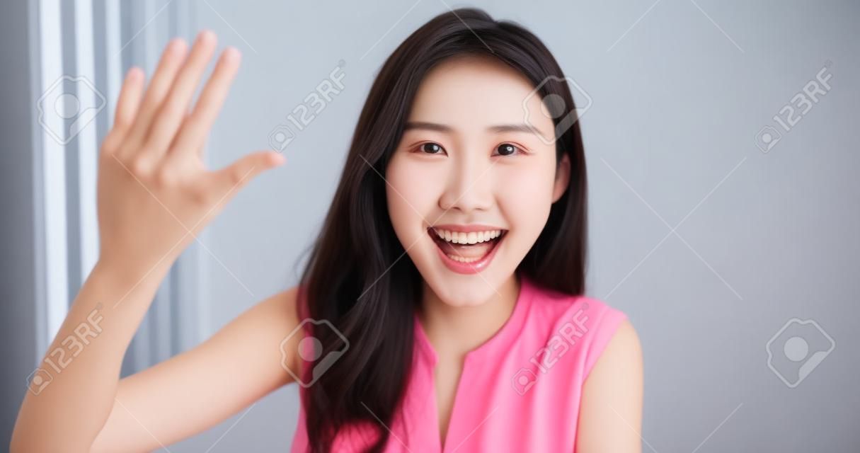 asian young woman has chat with friends with smart phone