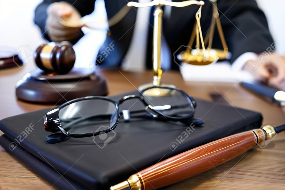 Judge gavel with Justice lawyers, Businessman in suit or lawyer working with legal law documents.  advice and justice law firm concept.