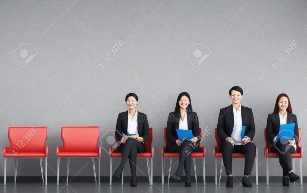 Asian business people are waiting for a job interview.