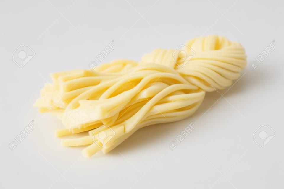 Cheese pigtail close up isolated on white