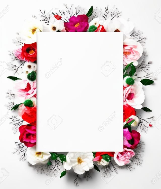 Festive flower concept : beautiful floral border on the white  background with copy space.  Flat lay.