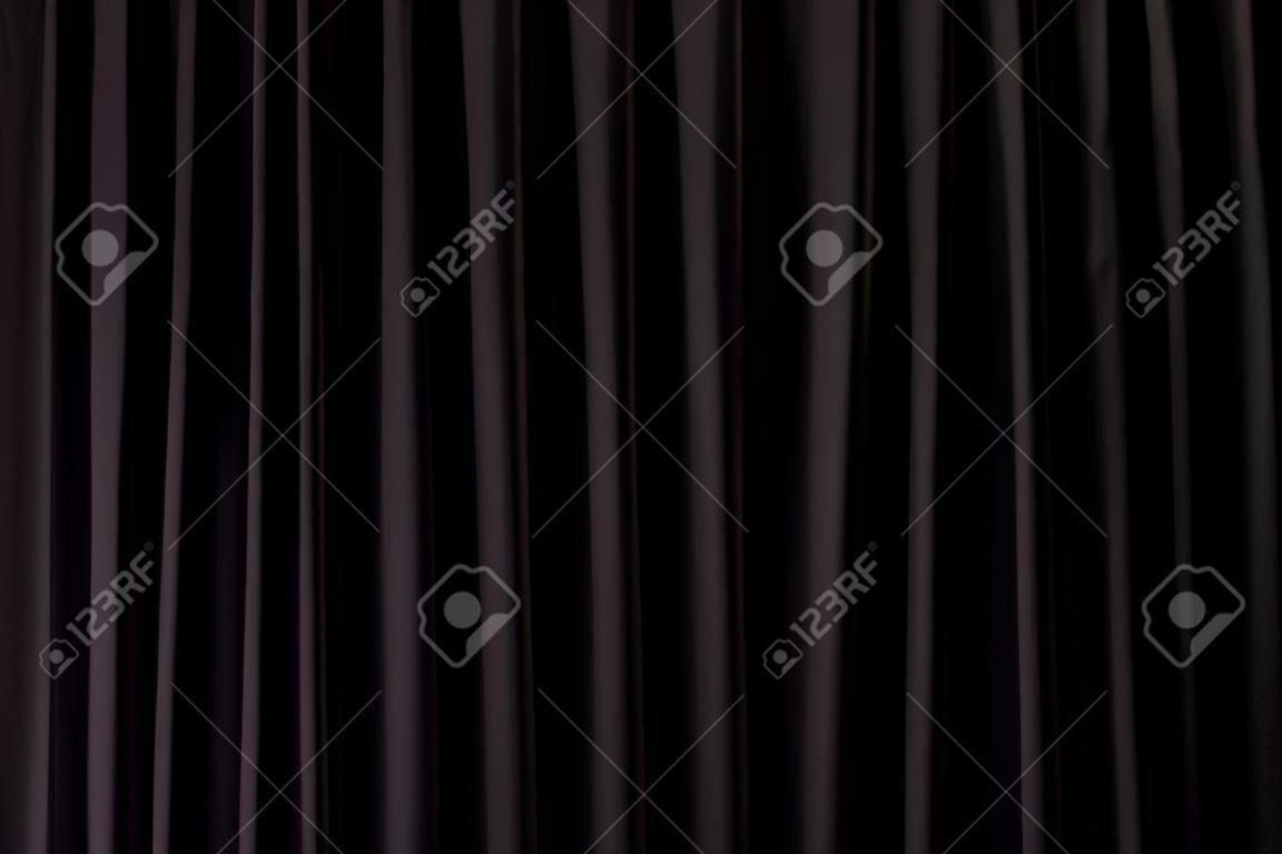 Detail eines schwarzen geschlossenen Vorhang im Theater