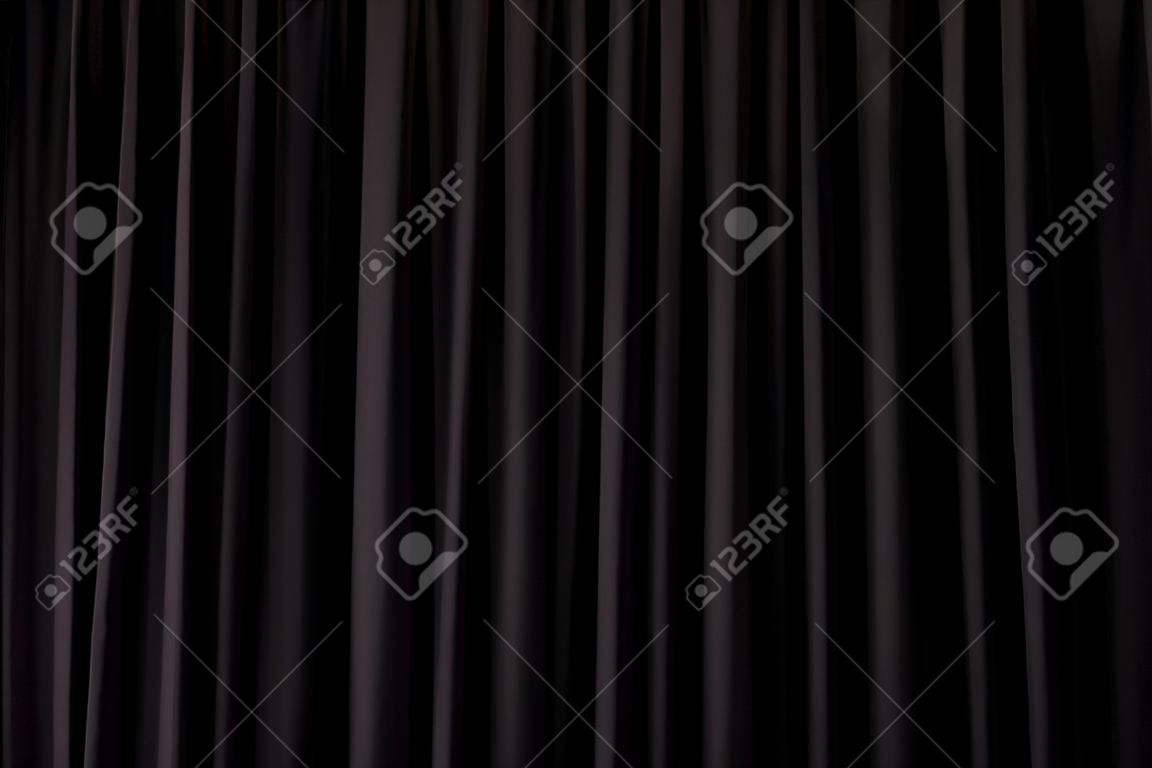 Detail eines schwarzen geschlossenen Vorhang im Theater