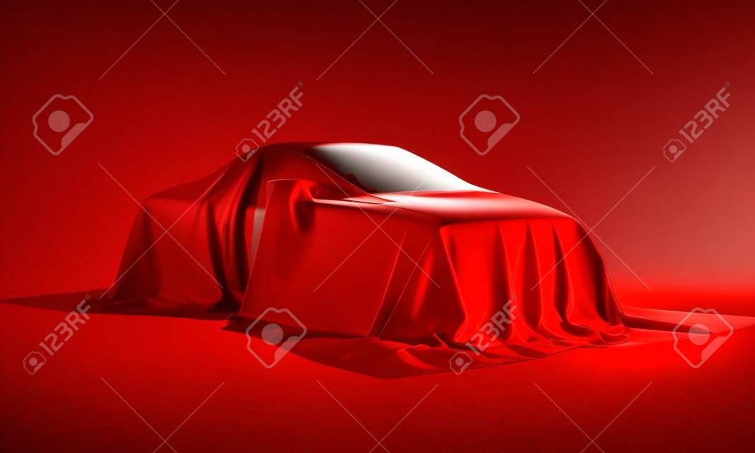 Apresentação do carro novo - automóvel coberto com um pano vermelho