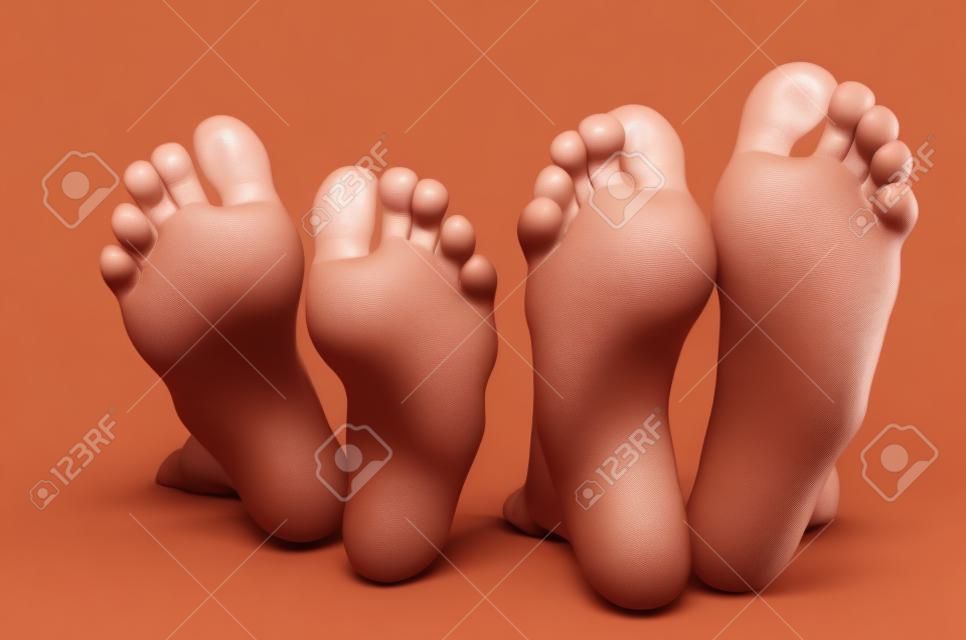 女性の脚と男性の足。