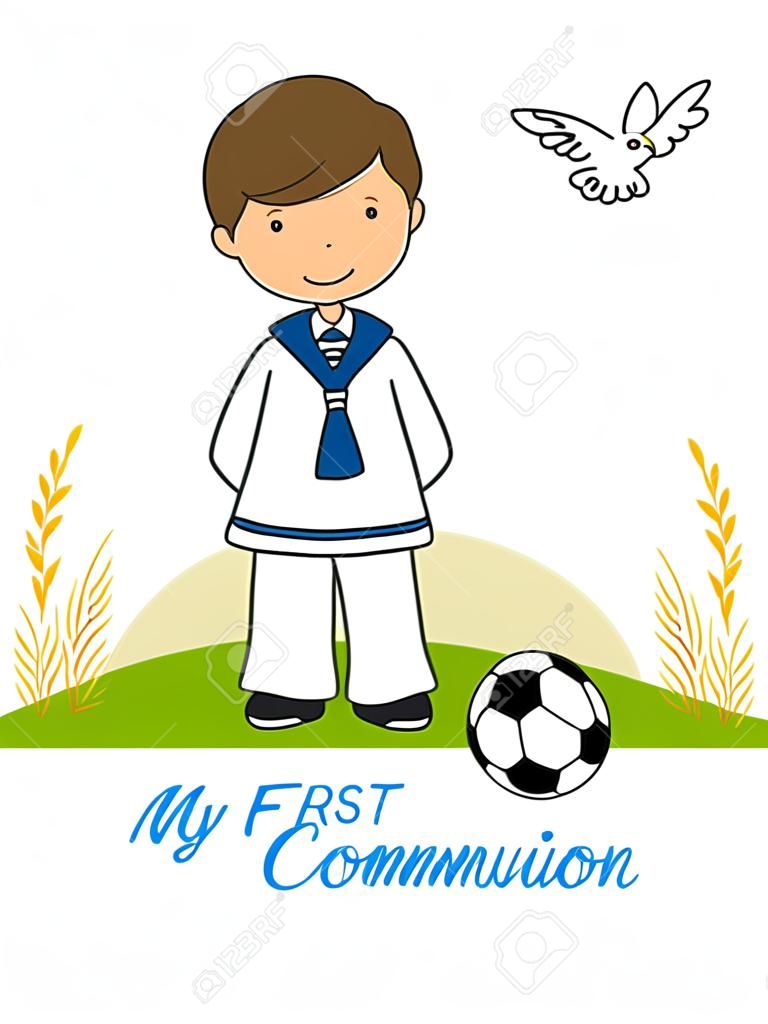 my first communion boy. Boy in communion costume and soccer ball