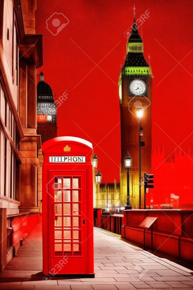 Tradycyjne czerwone budki telefoniczne i Big Ben w Londynie