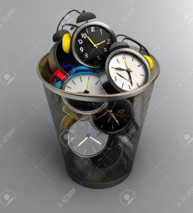 Wasting time concept: alarm clocks in the trash bin