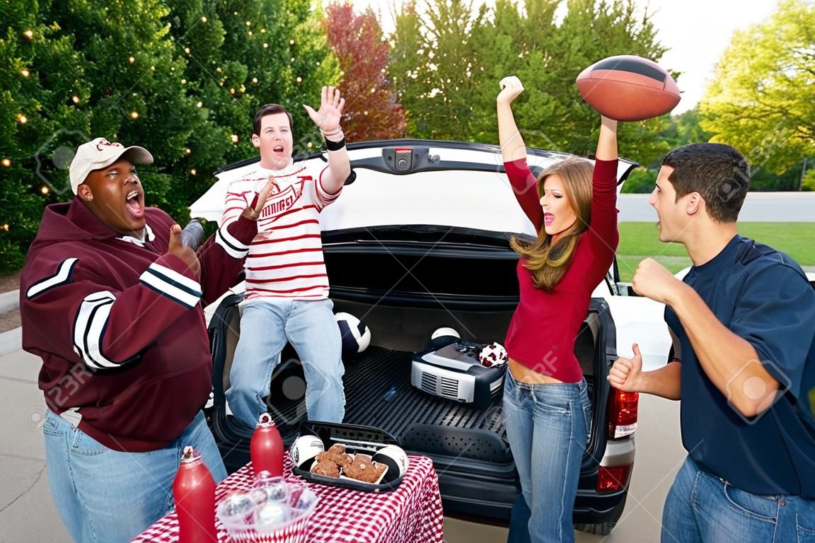 Tailgating: Group Of Friends Cheering While Listening To Football Game On Radio