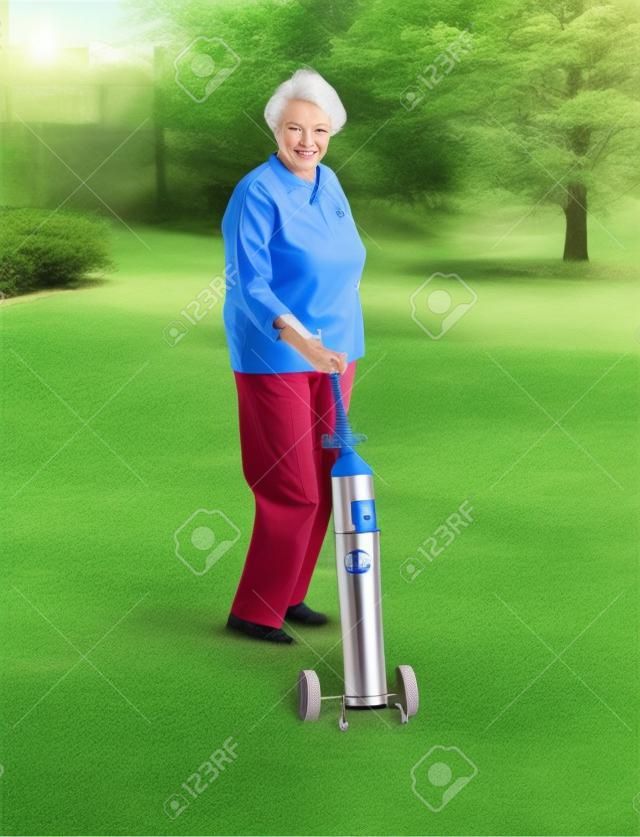senior lady with portable oxygen tank in backyard