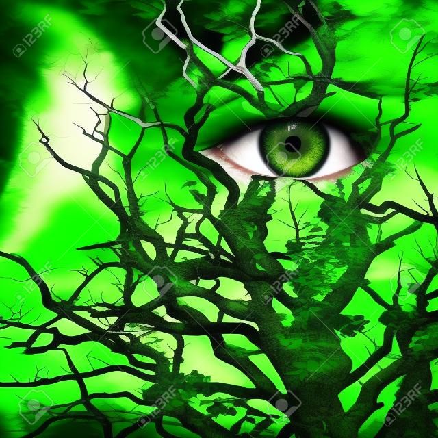 Cara con ojos verdes pintados con Medusa como árbol