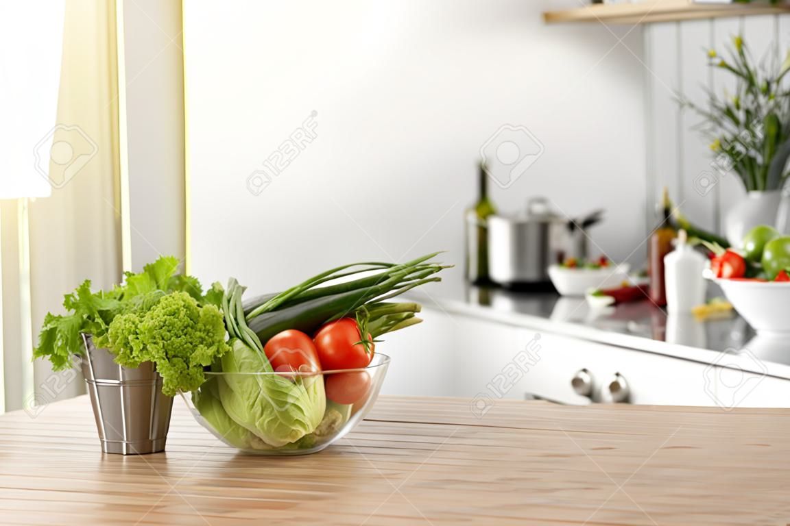 Fresh vegetables on wooden table in kitchen