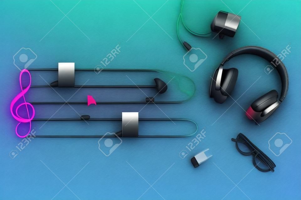 Modern headphones with video camera and music staff on color background