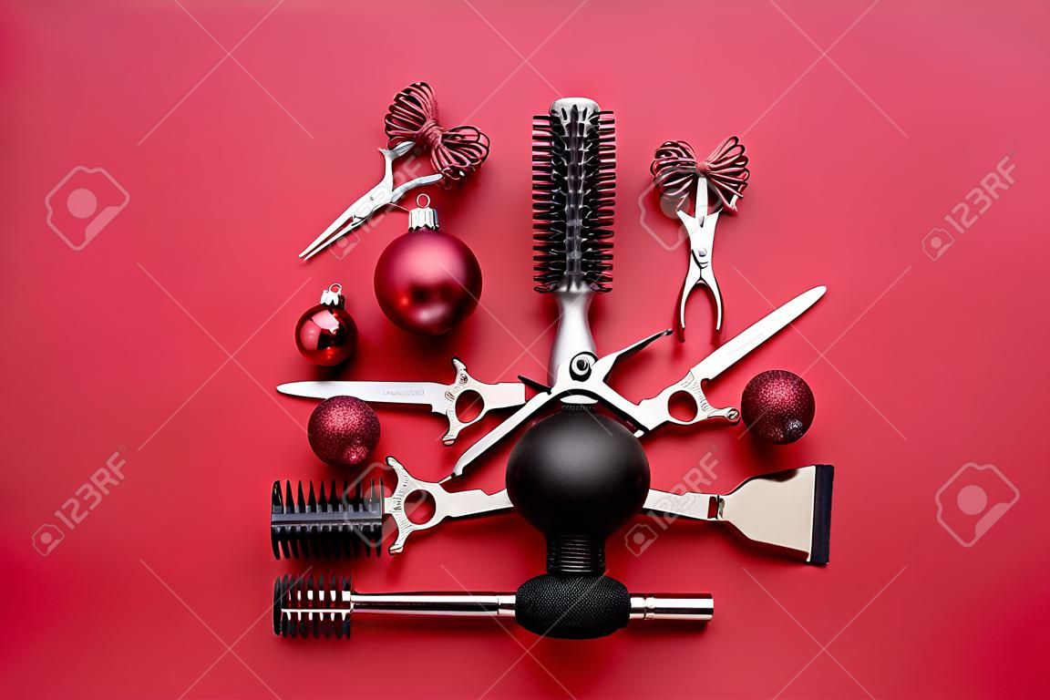 Beautiful Christmas tree made of hairdresser tools on color background