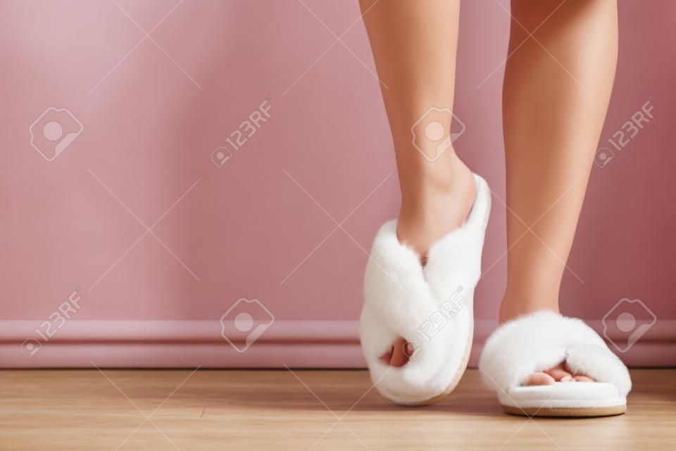 Woman in soft slippers at home