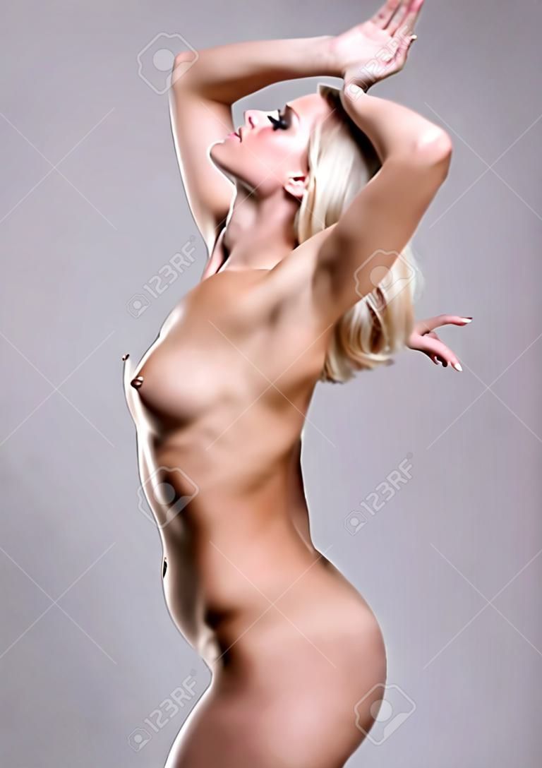 portrait of young blonde woman with beautiful body