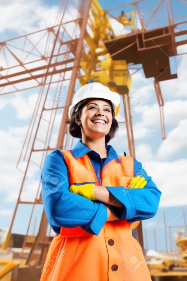 Smiling Woman at Construction Site