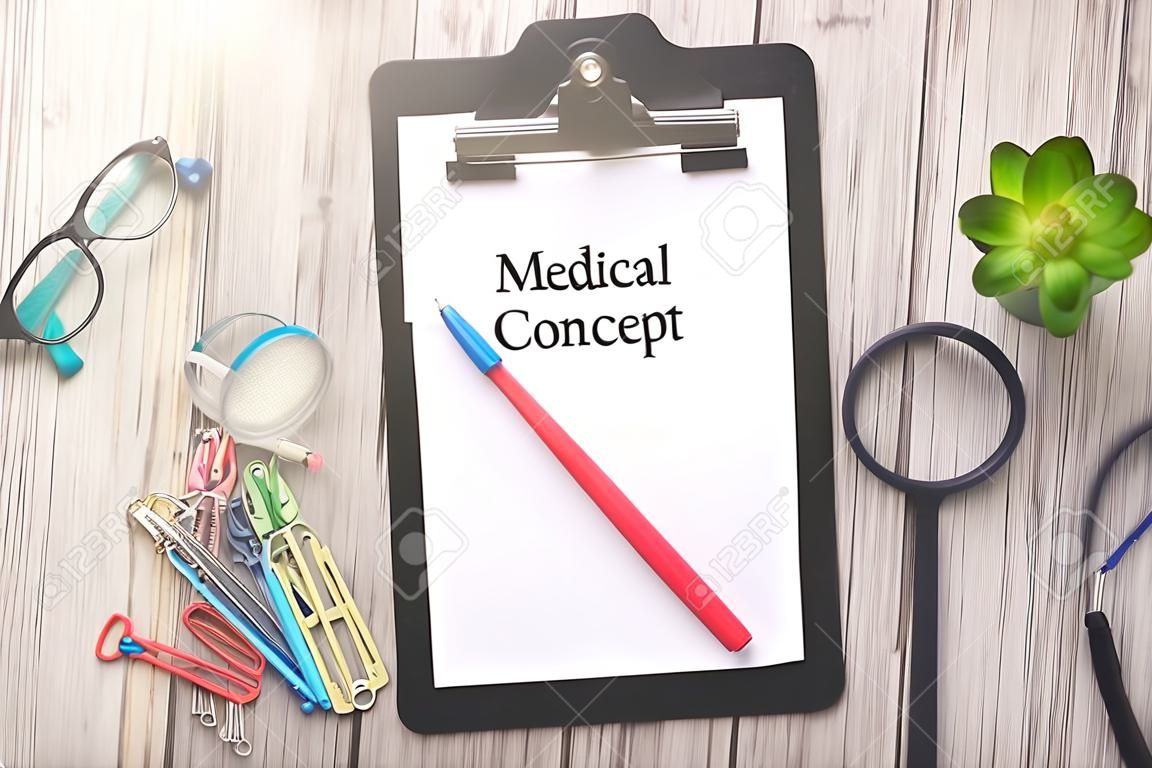 Clipboard with text written on paper - MEDICAL CONCEPT