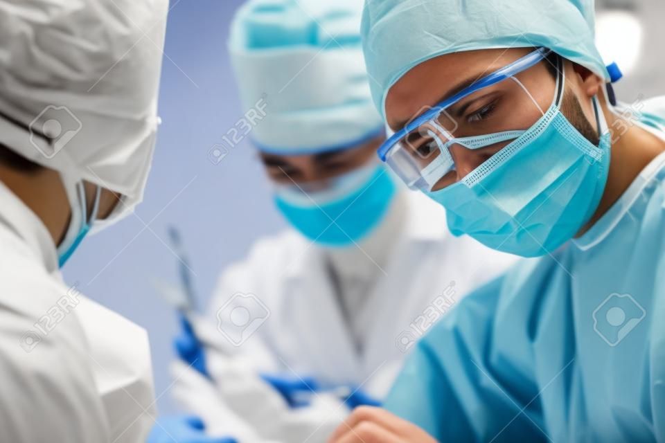 Shot of surgeons working on a patient in an operating room