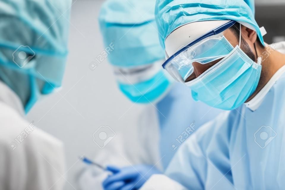 Shot of surgeons working on a patient in an operating room