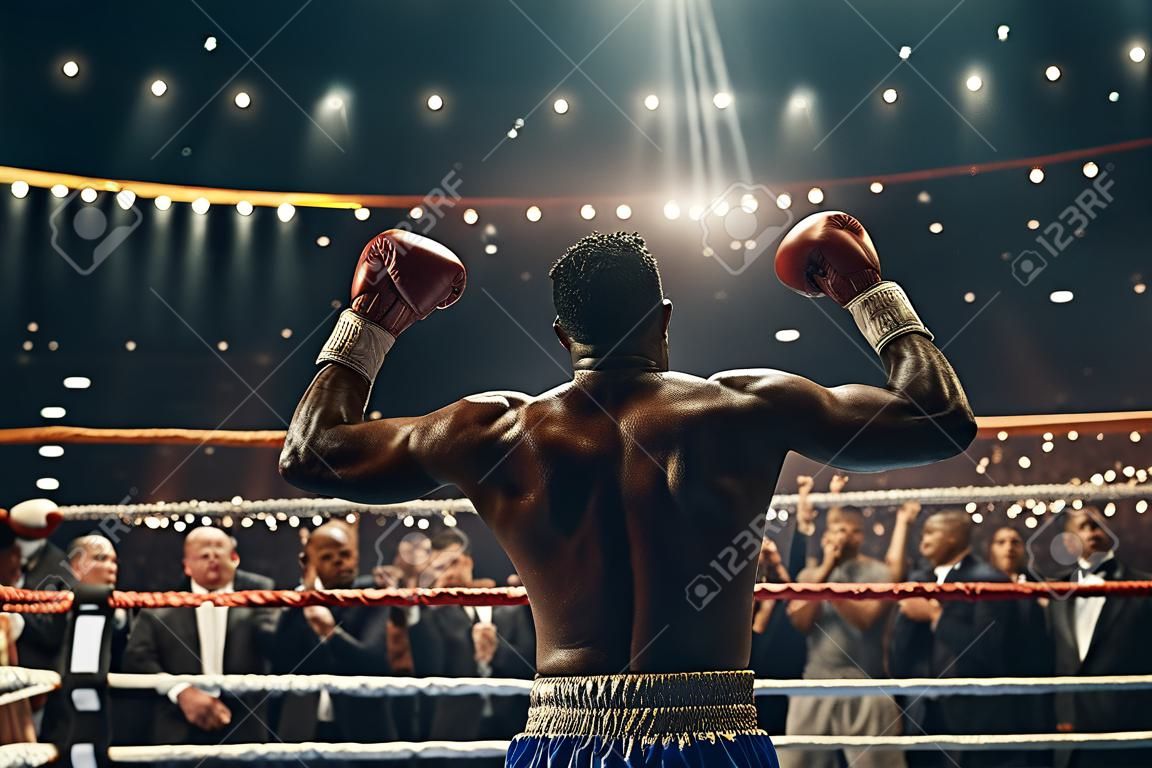 Handsome african american boxer in the ring during boxing match