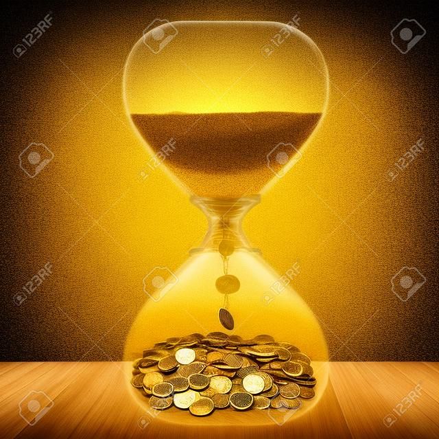 시간은 돈 금융 기회의 개념이다. 골드 먼지와 동전 모래 시계 회색 벽 배경에 고립