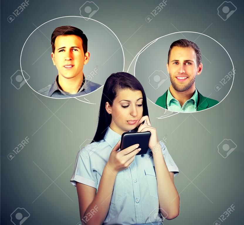 Thoughtful young woman thinking which man she likes loves the most using smartphone app