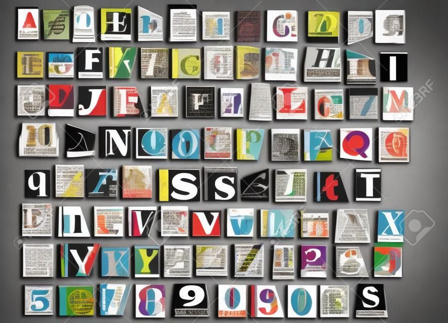Letters and numbers cut out from old magazines and newspapers Isolated on gray background