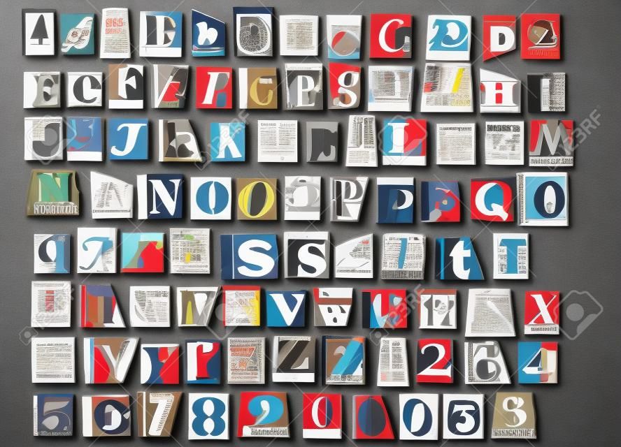 Letters and numbers cut out from old magazines and newspapers Isolated on gray background