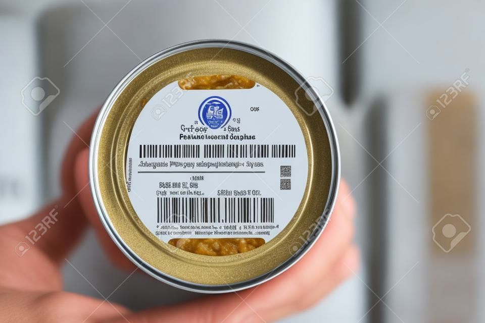 Packaged Date and Expire Date information on the bottom of the canned frozen food.