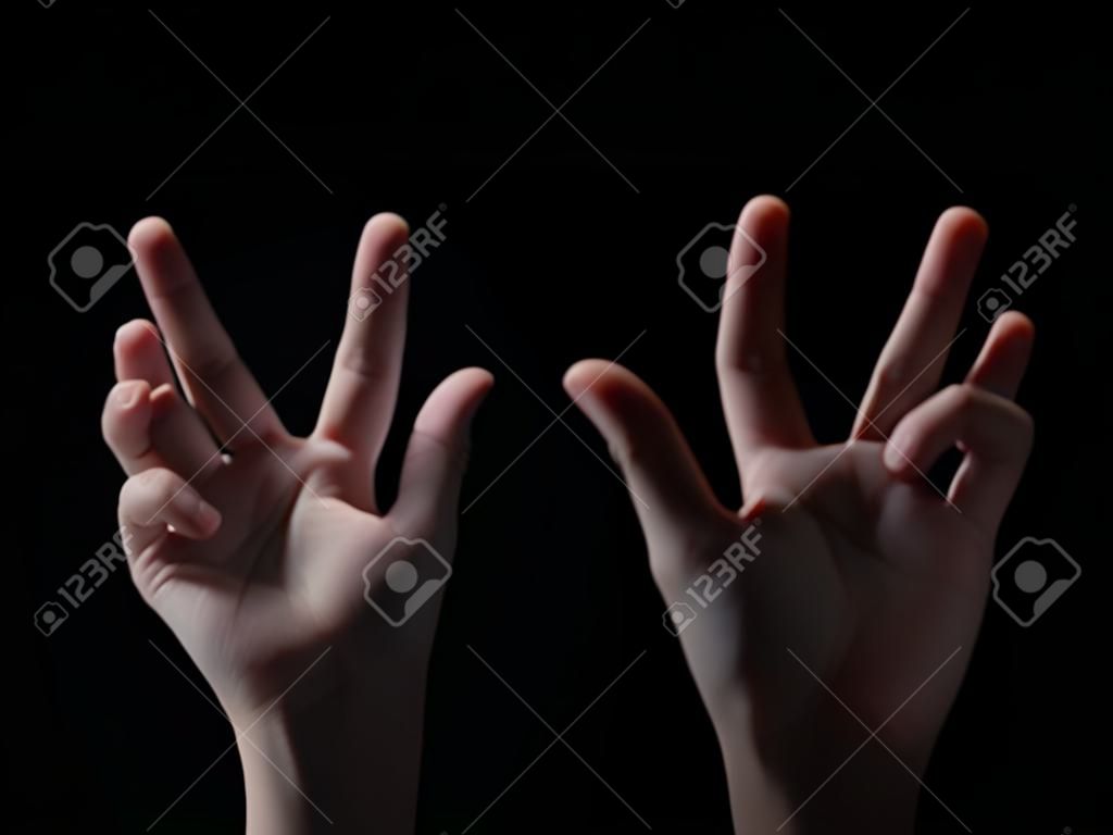 Icone delle mani su uno sfondo nero