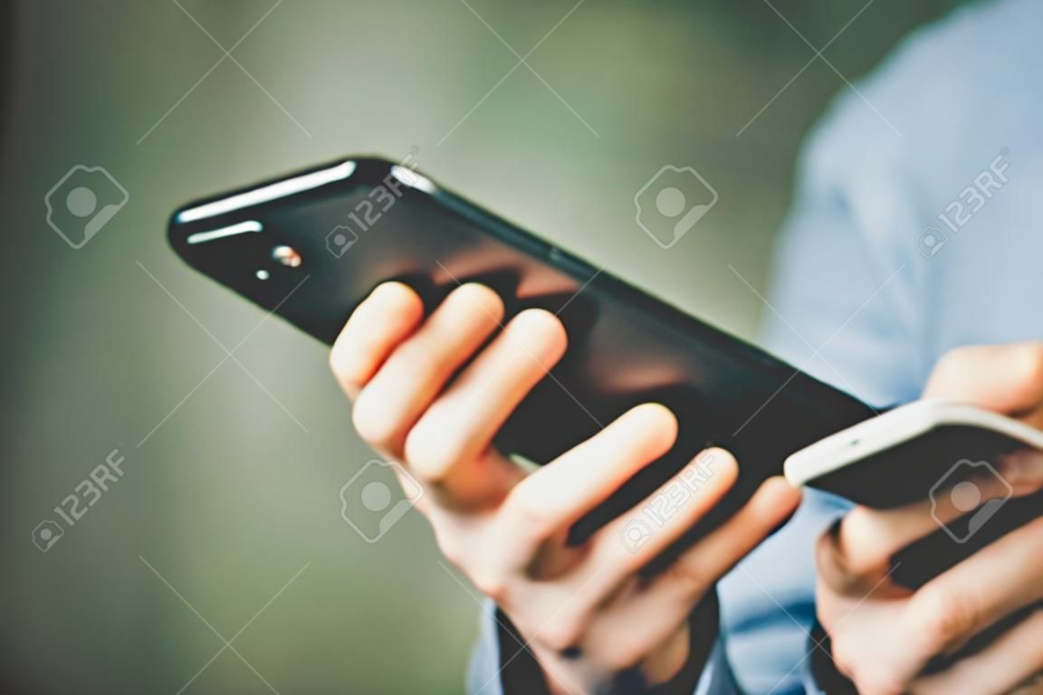 Male hands with smartphone