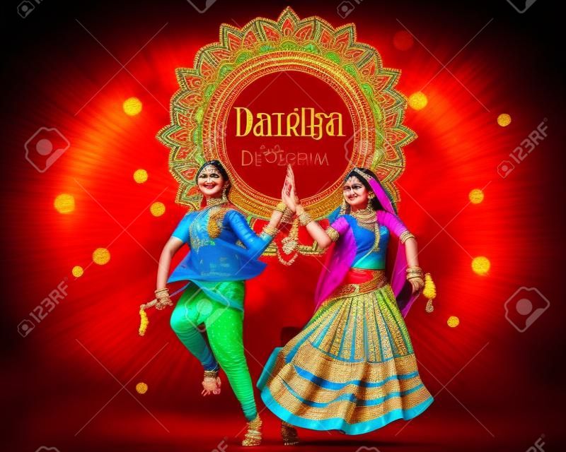 Indian people dancing Garba dance for Dandiya Disco Night event on Navratri Dussehra festival of India