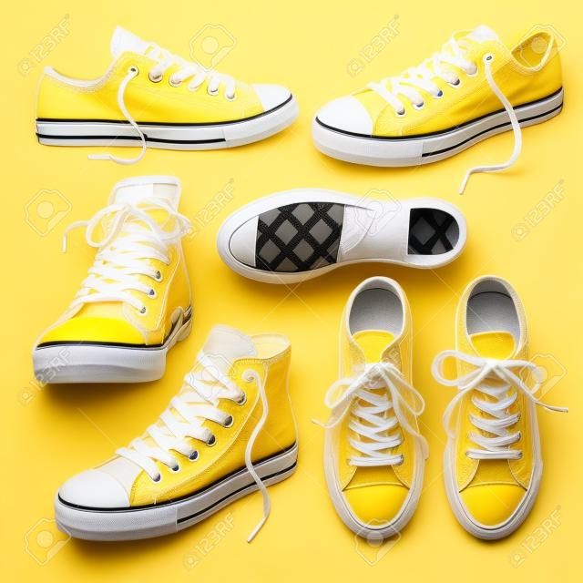 conjunto con zapatillas de deporte amarillas aisladas en blanco