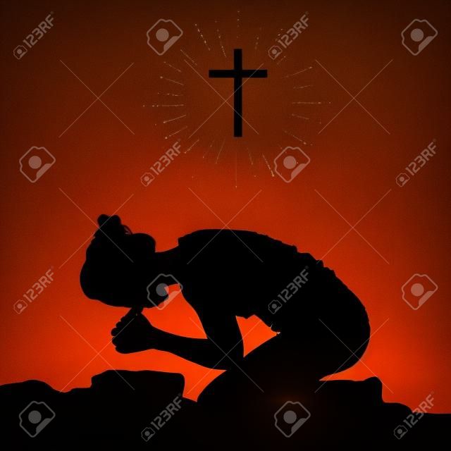 Silueta de una mujer arrodillada en oración