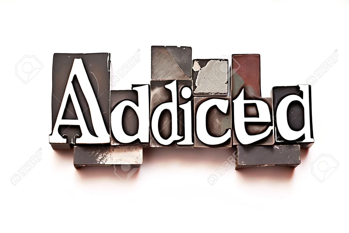 Le mot Addicted photographiées à l'aide d'typographie de type vintage