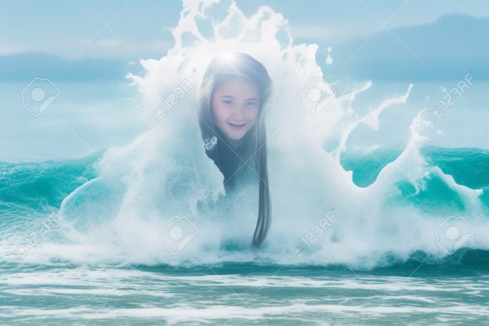 in summer, a beautiful young teenager girl with long hair, 13-14 years old, frolics on the beach in the foam of waves near the seashore