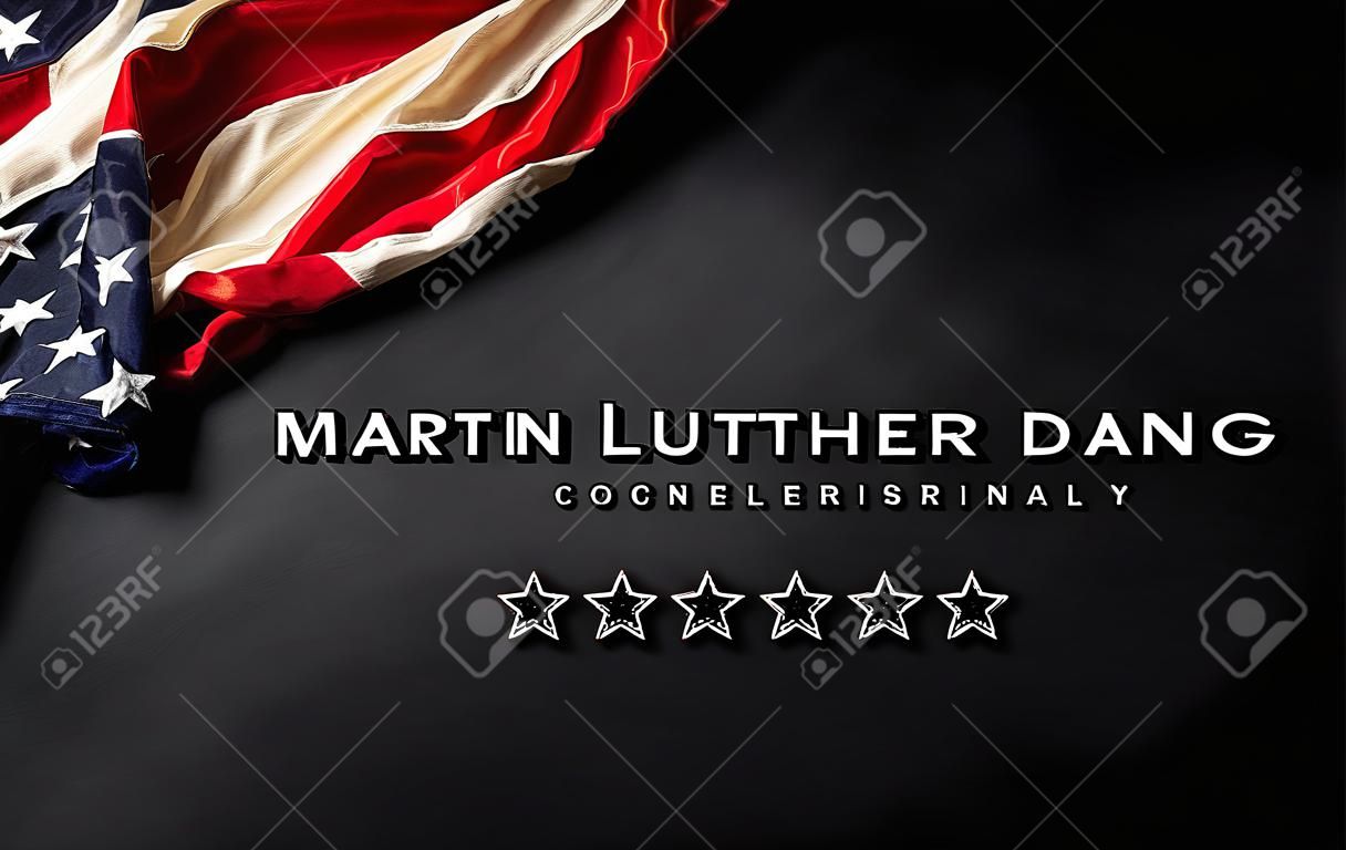 Martin Luther King Day celebrated concept. American flag against wooden background