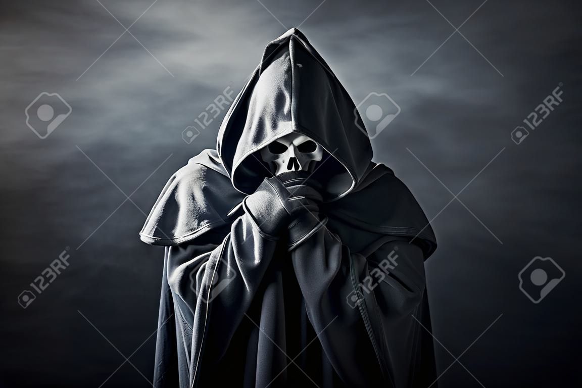 Ghostly figure in hooded cloak